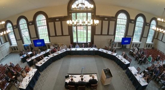 Overhead view of a Board of Trustees meeting in Wilbur Cross North Reading Room